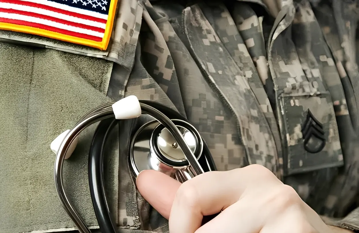 Military uniform with stethoscope and flag patch.
